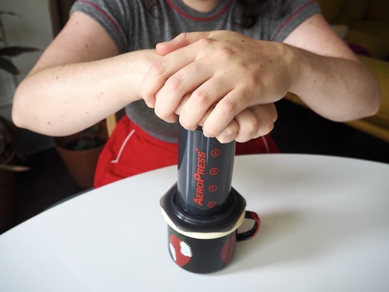 Push plunger down AeroPress