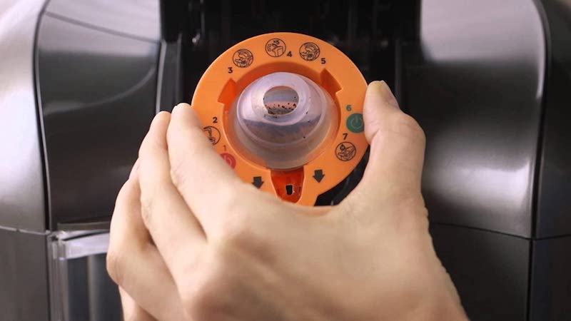 Keurig needle accessory with coffee grounds