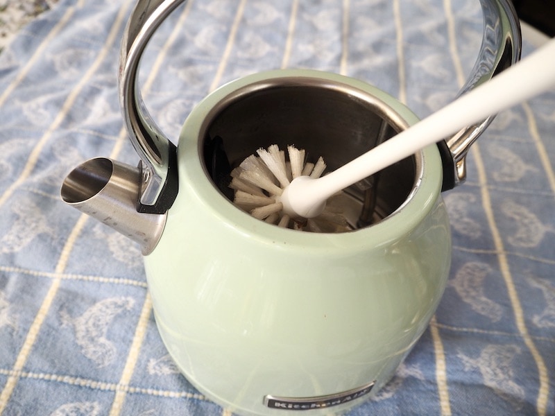 clean electric kettle with bottle brush