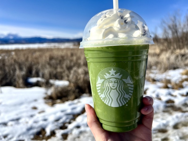 Starbucks Matcha Frappuccino with whipped cream and chocolate curls in to go cup_Kate