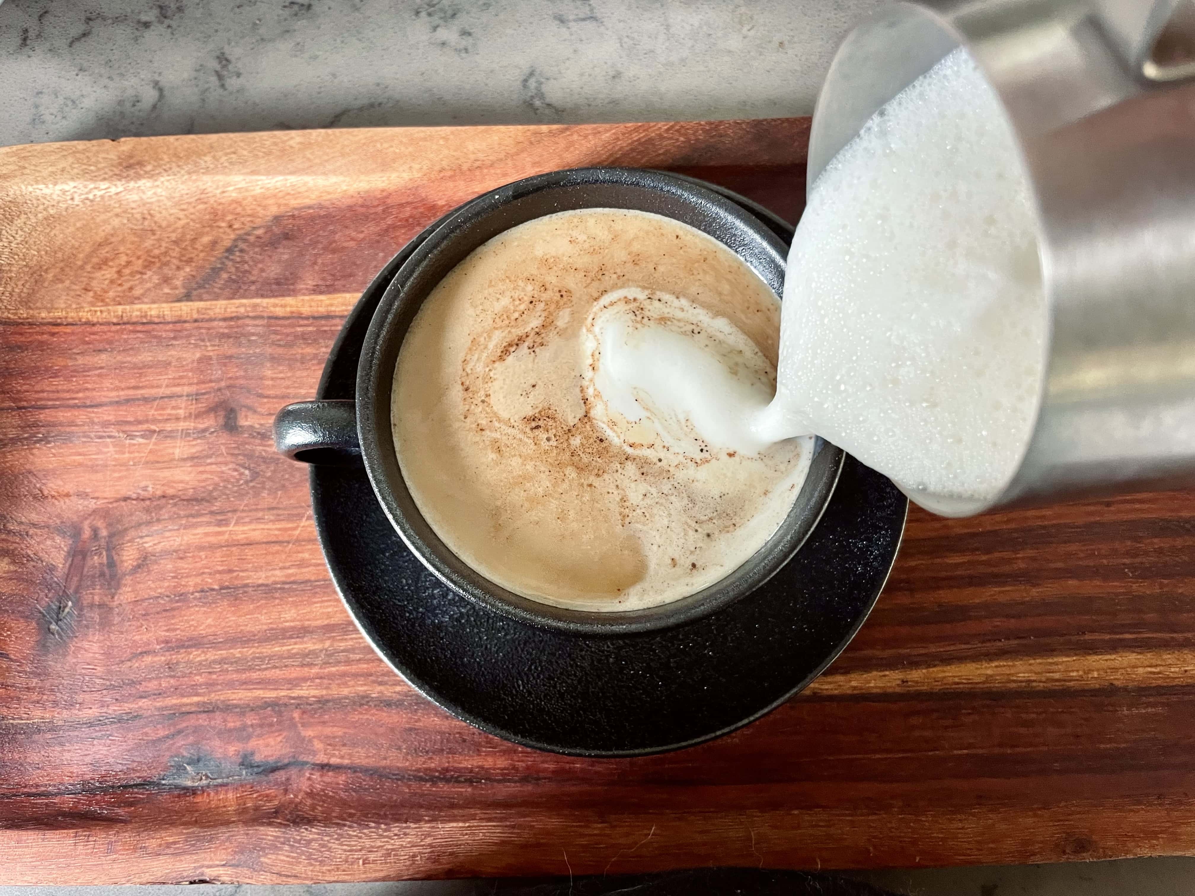 topping maple latte with frothed milk