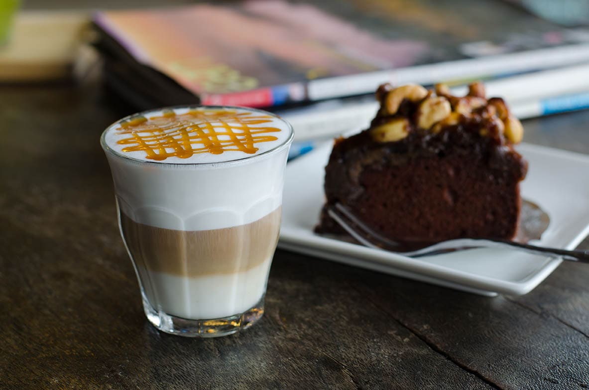 cloud caramel macchiato and slice of cake