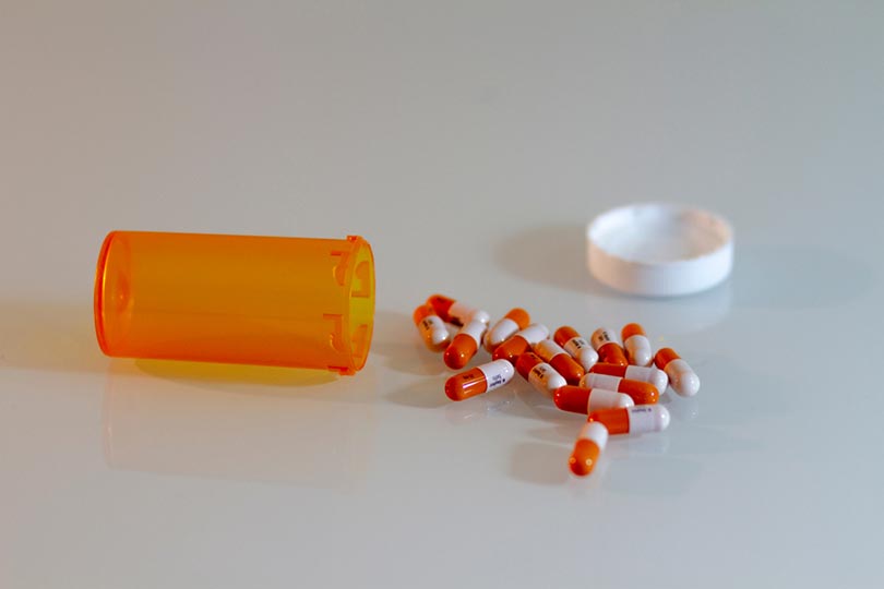 Adderall pills and an open bottle