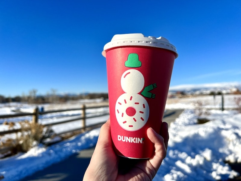 Dunkin hot drink in red paper cup outside_Kate
