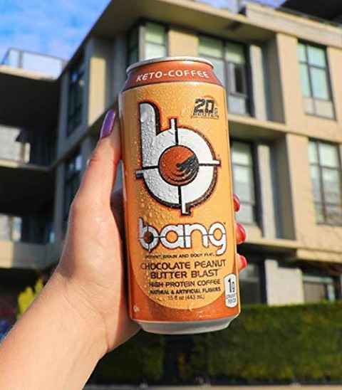 hand holding Bang Keto Coffee Chocolate Peanut Butter Blast Energy Drink
