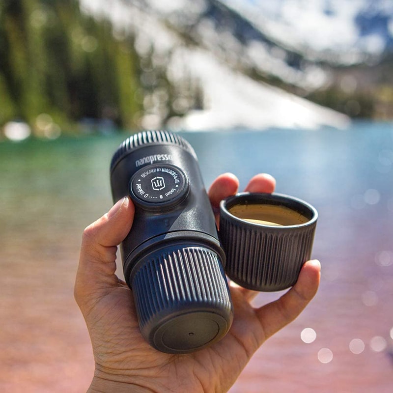 hand holding a Wacaco Nanopresso Portable Espresso Maker