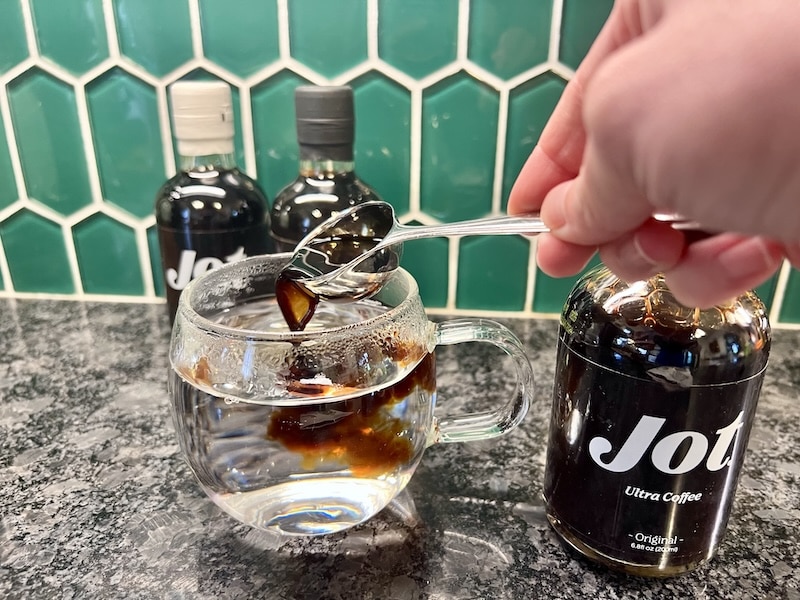 Brewing a hot cup of Jot original coffee